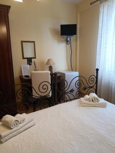 Postel nebo postele na pokoji v ubytování Ansise Guest House