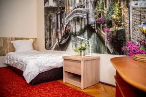 En eller flere senge i et værelse på Kwatery Rydz