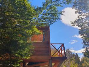 a tree house in the middle of a forest at Tiny House en el bosque in San Carlos de Bariloche