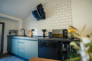 O bucătărie sau chicinetă la Alojamiento domotizado Casa el Campanario +12 fotografii