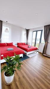 Giường trong phòng chung tại Nyby Villa Dalat by NHATUIshare