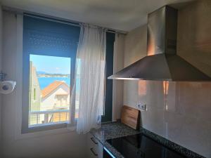Una cocina o zona de cocina en Apartamento Nara Playa