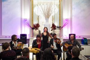 a group of people sitting in a room with instruments at Hotel C2 in Marseille