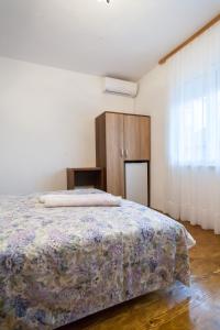 Кровать или кровати в номере Rooms Molabeciri