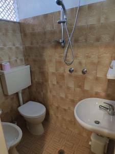 Koupelna v ubytování Hotel Gioiella