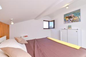 Ένα ή περισσότερα κρεβάτια σε δωμάτιο στο Apartment Aurora