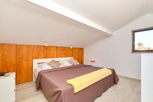 Ένα ή περισσότερα κρεβάτια σε δωμάτιο στο Apartment Aurora