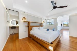 Ένα ή περισσότερα κρεβάτια σε δωμάτιο στο Pet friendly Luxury stay walk to beach