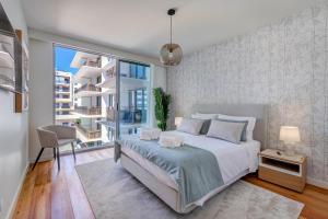 Postel nebo postele na pokoji v ubytování Cond Bayline LUX BEACH&SPA APARTMENT - Atum - BY BEDZY + 42 fotografií