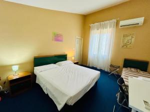 Smart Hotel Autodromo客房内的一张或多张床位