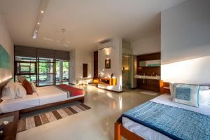 Ένα ή περισσότερα κρεβάτια σε δωμάτιο στο Bentota No 1