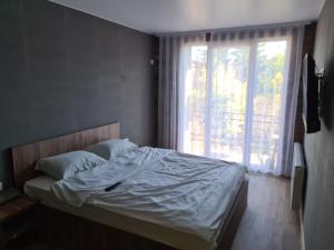 Voodi või voodid majutusasutuse Apartment on Stefan cel mare 16 toas