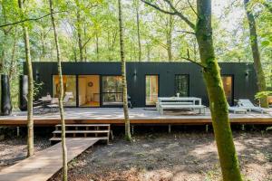 Zahrada ubytování Luxe chalet met sauna in een oase van rust