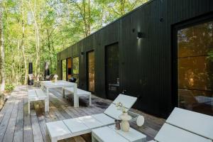 Fotografie z fotogalerie ubytování Luxe chalet met sauna in een oase van rust v destinaci Hulshout