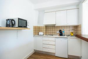 Kuchyňa alebo kuchynka v ubytovaní Apartament Massanet 1c