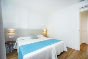 Posteľ alebo postele v izbe v ubytovaní Apartament Massanet 1c