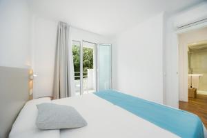 Posteľ alebo postele v izbe v ubytovaní Apartament Massanet 1c