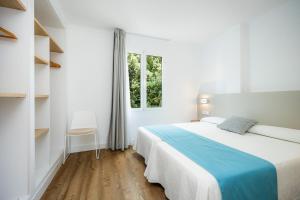 Posteľ alebo postele v izbe v ubytovaní Apartament Massanet 1c