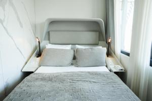 Postel nebo postele na pokoji v ubytování Boutique Hotel Herman K