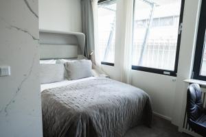 Postel nebo postele na pokoji v ubytování Boutique Hotel Herman K