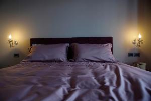 Кровать или кровати в номере Venere B&B