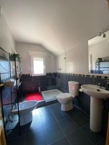 Koupelna v ubytování Luz de Luna + 18 fotografií