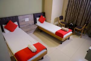 Postel nebo postele na pokoji v ubytování Hotel Mansi