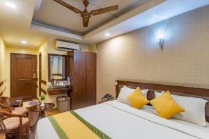 Rúm í herbergi á Yellow Pagoda Hotel