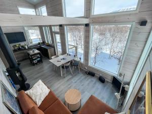 Μια τηλεόραση ή/και κέντρο ψυχαγωγίας στο Holiday Home Saana aurora by Interhome