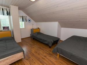 Postel nebo postele na pokoji v ubytování Holiday Home Kaisla by Interhome