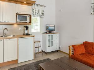 Kuchyň nebo kuchyňský kout v ubytování Holiday Home Kaisla by Interhome