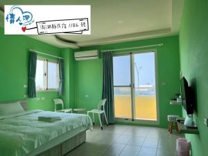 Letto o letti in una camera di 情人灣二館