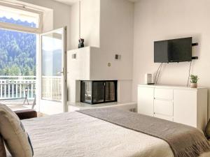 Postel nebo postele na pokoji v ubytování Studio Alpes et Lac 14 by Interhome