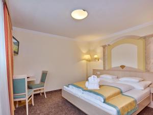 Ένα ή περισσότερα κρεβάτια σε δωμάτιο στο Apartment La Vita by Interhome