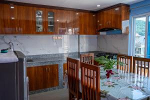 Kuchyň nebo kuchyňský kout v ubytování Homestay Book Now + 12 fotografií