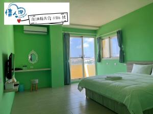 Letto o letti in una camera di 情人灣二館