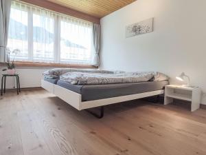 Ένα ή περισσότερα κρεβάτια σε δωμάτιο στο Apartment Verbena-3 by Interhome
