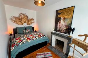 Ένα ή περισσότερα κρεβάτια σε δωμάτιο στο Appartement L’Éclat du Colza