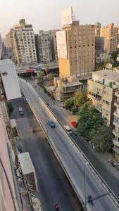 an overhead view of a city street with buildings at شقة فاخرة لعائلة بالمهندسين in Cairo