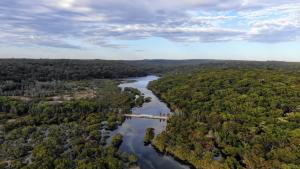 an aerial view of a river with a bridge at Sensational Ocean Views In Maianbar in Maianbar