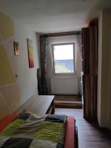 Postel nebo postele na pokoji v ubytování Villa Kunterbunt