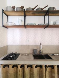 Η κουζίνα ή μικρή κουζίνα στο OCEAN BEACH STUDIO - Taipu de Fora +12 φωτογραφίες