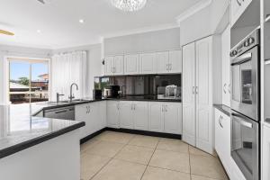 Galería fotográfica de Waterfront Luxury Pool-Spa-Jetty-Pool Table en Daleys Point