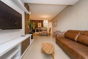 O zonă de relaxare la Boulevard 224D - Excelente apartamento em condomínio de luxo no centro de Bombinhas - Piscina - Jacuzzi - Academia - Portaria 24h.