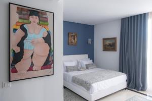 Postel nebo postele na pokoji v ubytování L'Hôtel Particulier La Marsa