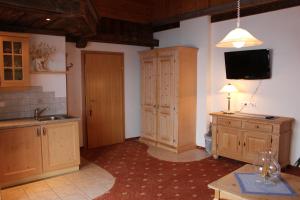 Kuchyň nebo kuchyňský kout v ubytování Himmelbauer Apartments