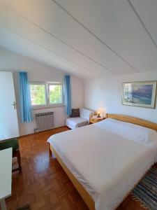 Posteľ alebo postele v izbe v ubytovaní Levak Apartments - Apt. 1