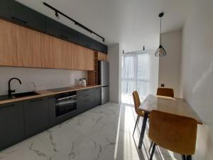 Kuchyň nebo kuchyňský kout v ubytování ЖК Київскай