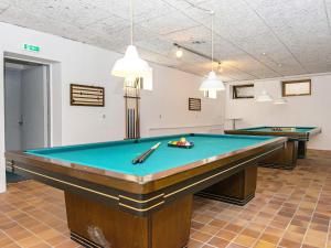 a billiard room with two pool tables in it at Apartment in Holiday Park in Vederso Klit in Ulfborg