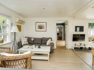 Posezení v ubytování Holiday home Græsted IV + 15 fotografií